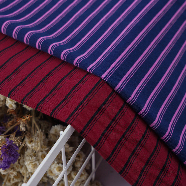 Tejido de material rayado de tejido liso de algodón puro suave para camiseta de polo amigable con la piel