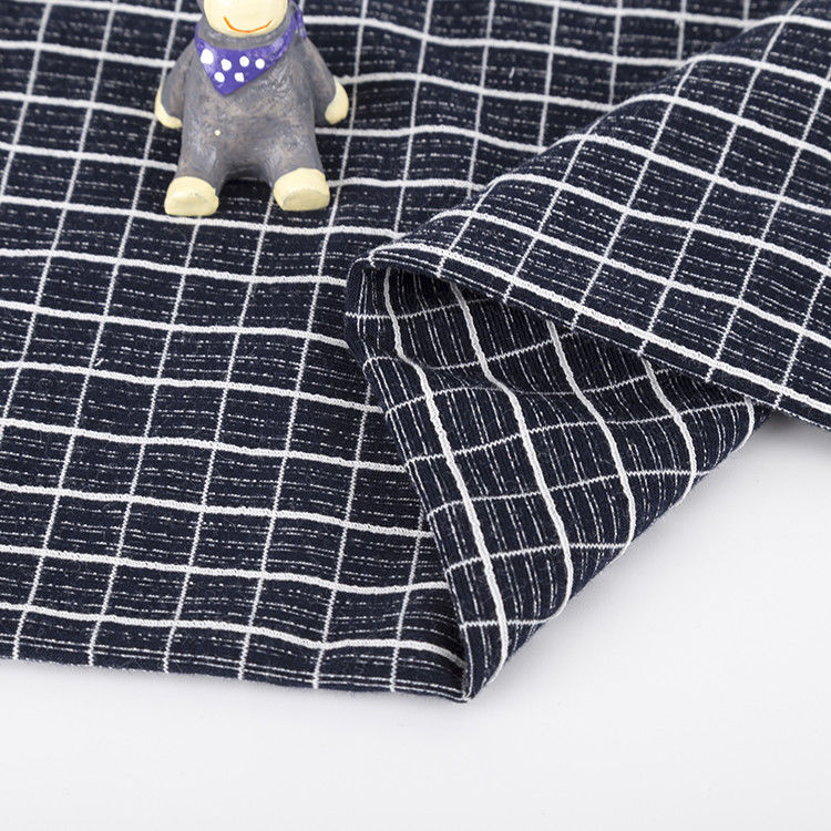 Tejido de camiseta de algodón peinado Tejido apretado Refrescante Tejido de malla de cuadrado Para camiseta de polo