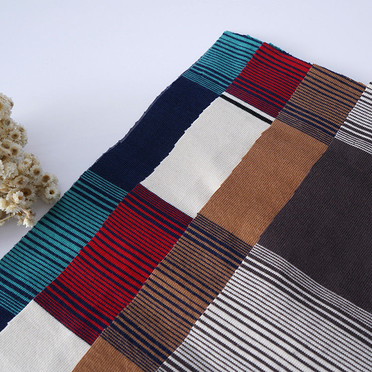Texto cómodo y amigable para la piel Tejido flexible de material rayado para camisa de polo