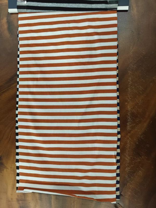 Absorción de sudor y suavidad Tejido de algodón puro a rayas para camisa de polo