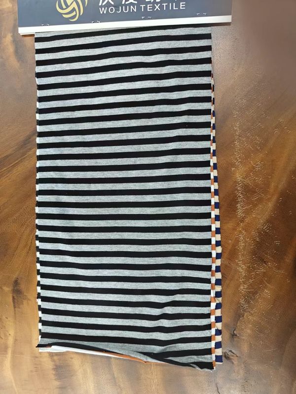 Absorción de sudor y suavidad Tejido de algodón puro a rayas para camisa de polo