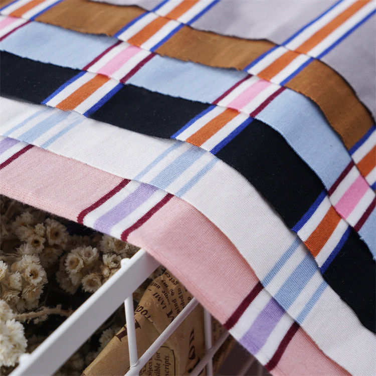 Tejido de punto a rayas de algodón multicolor y de moda para camiseta