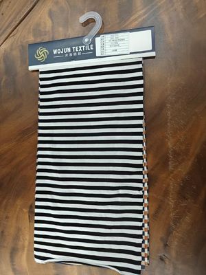 Absorción de sudor y suavidad Tejido de algodón puro a rayas para camisa de polo