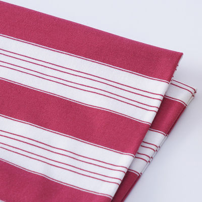 Un buen precio. Tejido de punto natural de rayas para camiseta en línea